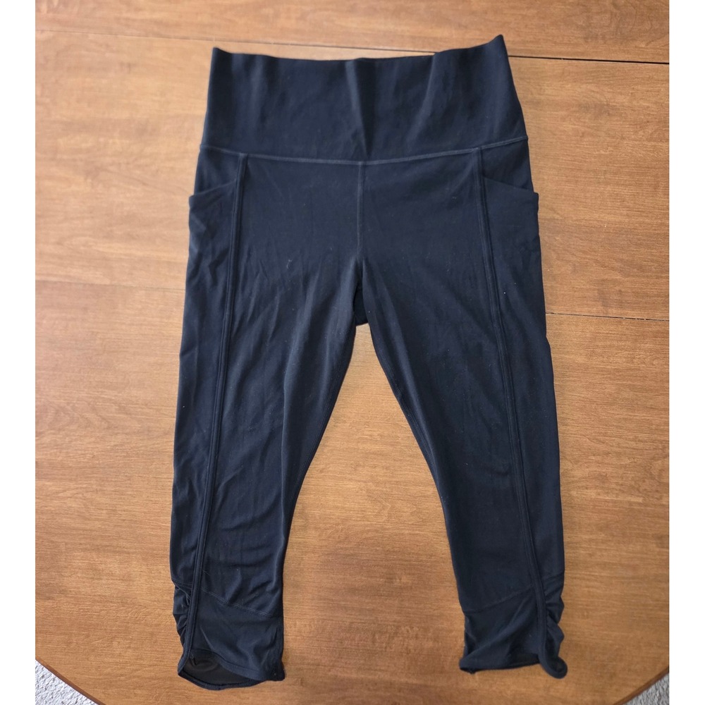 Athleta Salutation Stash Pocket II Capri Black High Rise Mesh Ruched Leggings M